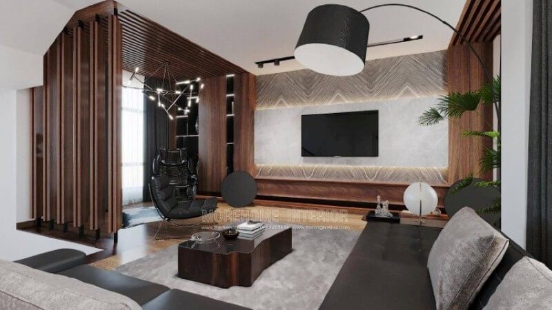 Có thể nói sofa góc là một trong những lựa chọn không thể bỏ qua cho mọi không gian đặc biệt trong thiết kế nội thất phòng khách biệt thự. Tuy nhiên cách kết hợp làm sao để tất cả tạo nên vẻ đẹp tổng hòa từ gam màu bộ sofa, kiểu dáng bàn trà. Như trong mẫu thiết kế nội thất phòng khách biệt thự này, kts Morehome đã lựa chọn chiếc bàn gỗ nguyên tấm gỗ óc chó, loại gỗ quý với vô vàn điểm mạnh, vân gỗ 3D tuyệt đẹp, gam màu độc đáo ko đơn điệu chuyển hóa từ nâu nhạt đến socola đậm hơn là tím đỏ,..